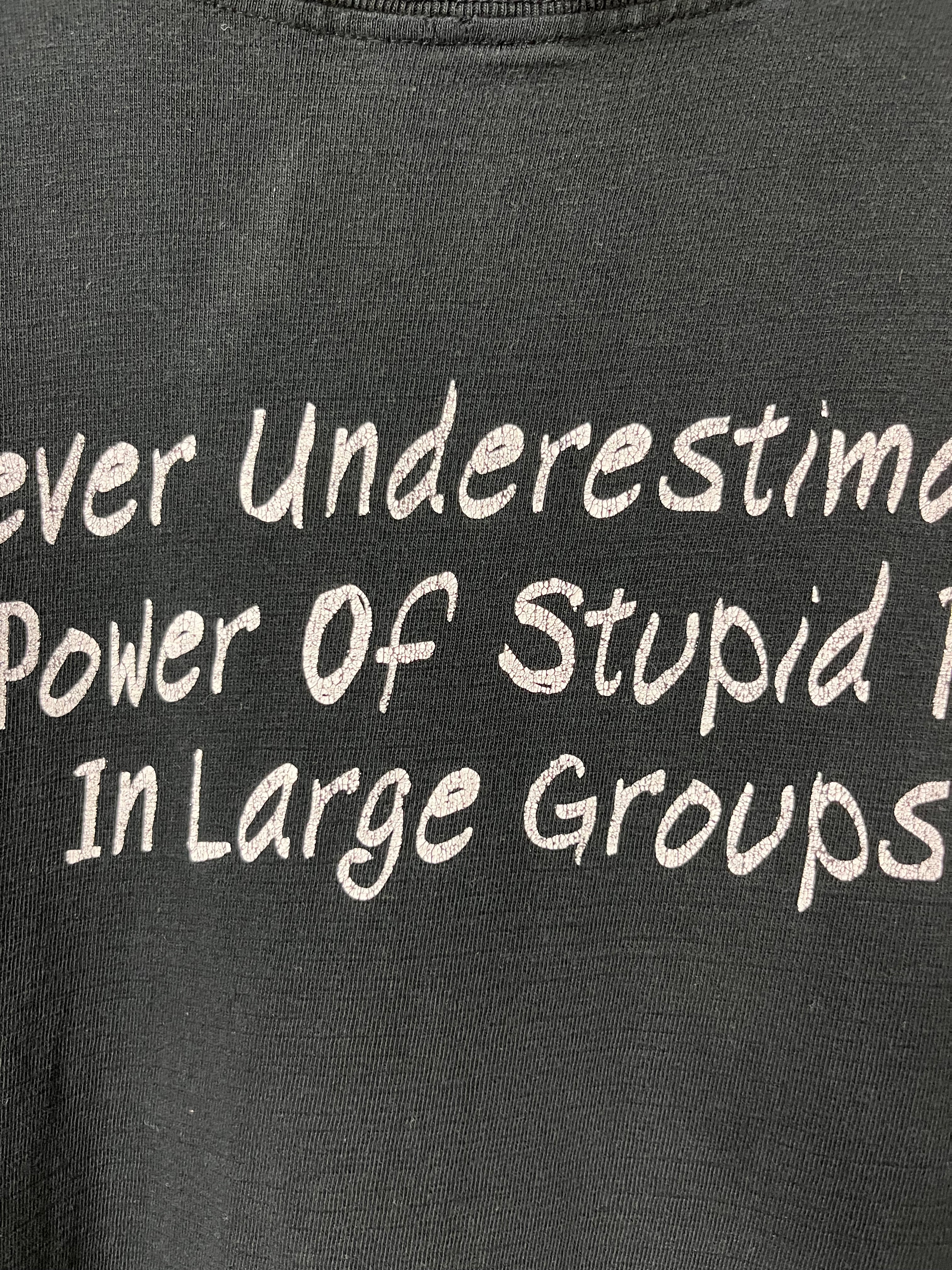 Late 90s/Early ‘00s ‘Never Underestimate the Power of Stupid People’ Distressed T-Shirt - Faded Black - L/XL